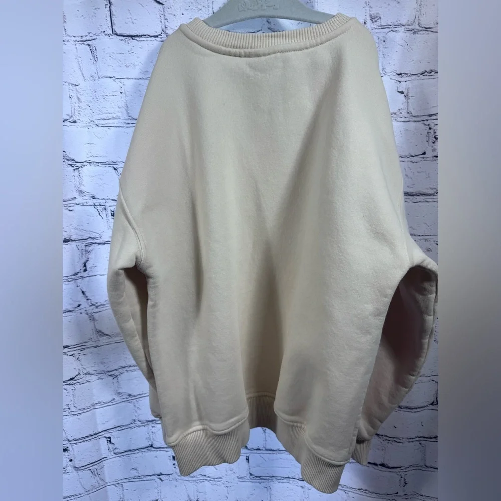 Zara Rolling Stones Cream Sweater